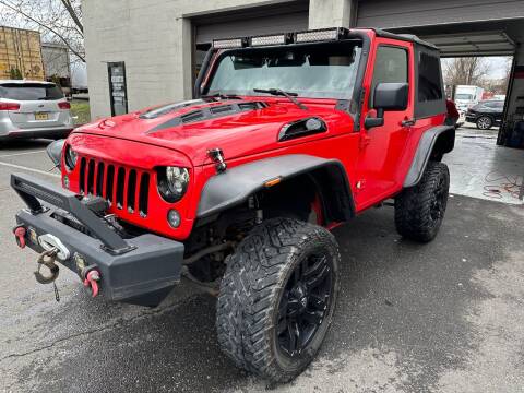 2016 Jeep Wrangler for sale at Auto Direct Inc in Saddle Brook NJ
