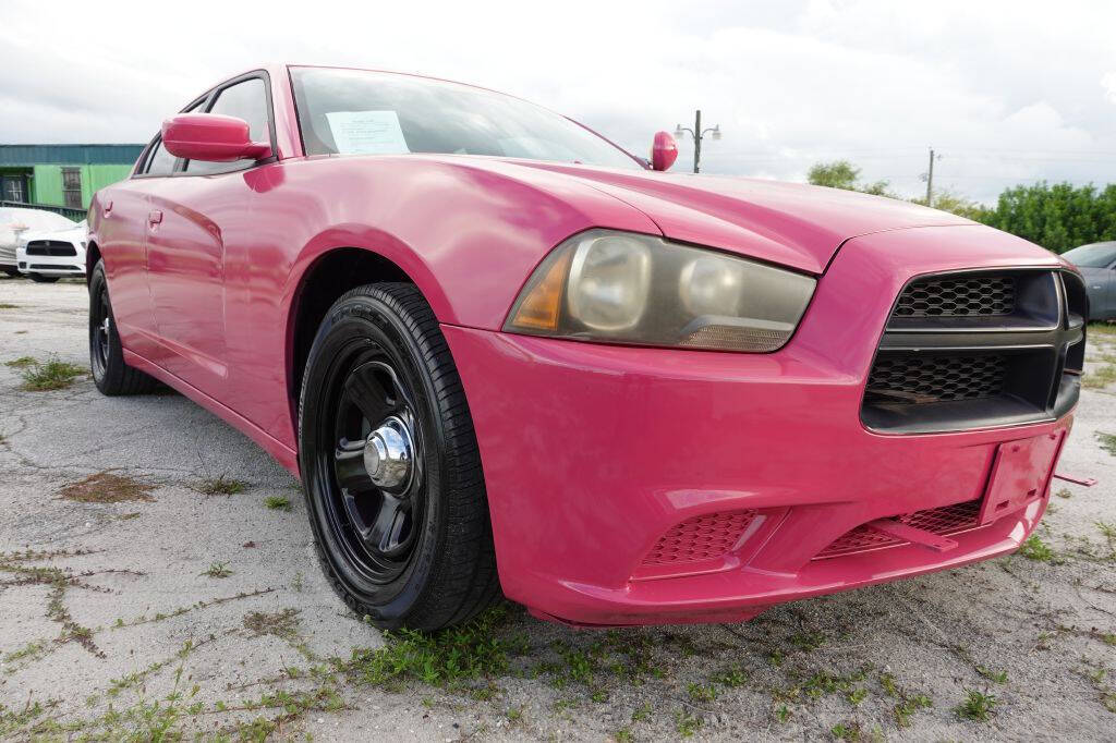 2013 Dodge Charger for sale at Warren's Auto Sales, Inc. in Lakeland, FL