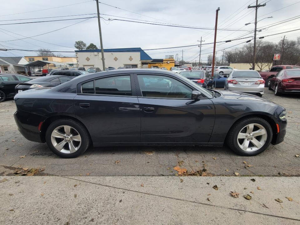 2017 Dodge Charger for sale at DAGO'S AUTO SALES LLC in Dalton, GA