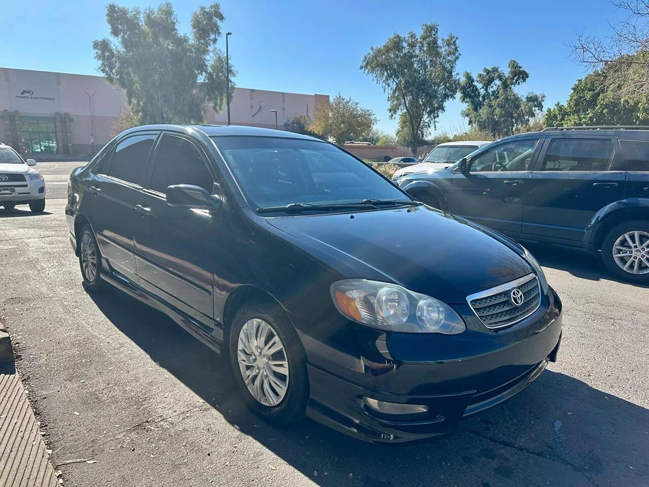 2007 Toyota Corolla for sale at HUDSONS AUTOS in Gilbert, AZ