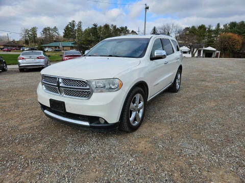 2011 Dodge Durango for sale at Daves Supreme Auto Sales LLC in Gallipolis OH