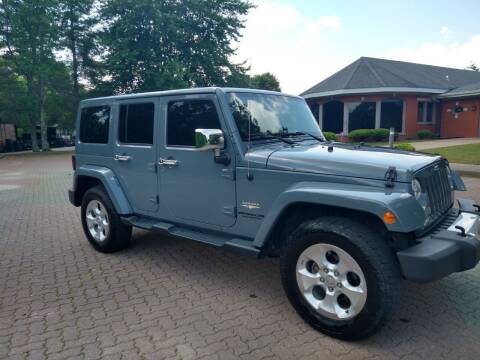 2014 Jeep Wrangler Unlimited for sale at CARS PLUS in Fayetteville TN