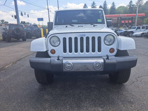 2012 Jeep Wrangler Unlimited for sale at Newport Auto Group in Boardman OH