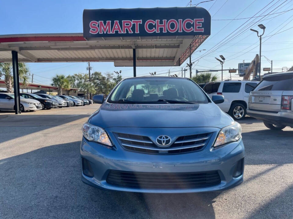 2013 Toyota Corolla for sale at SMART CHOICE AUTO in Pasadena, TX