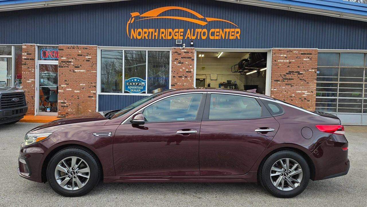 2019 Kia Optima for sale at North Ridge Auto Center LLC in Madison, OH