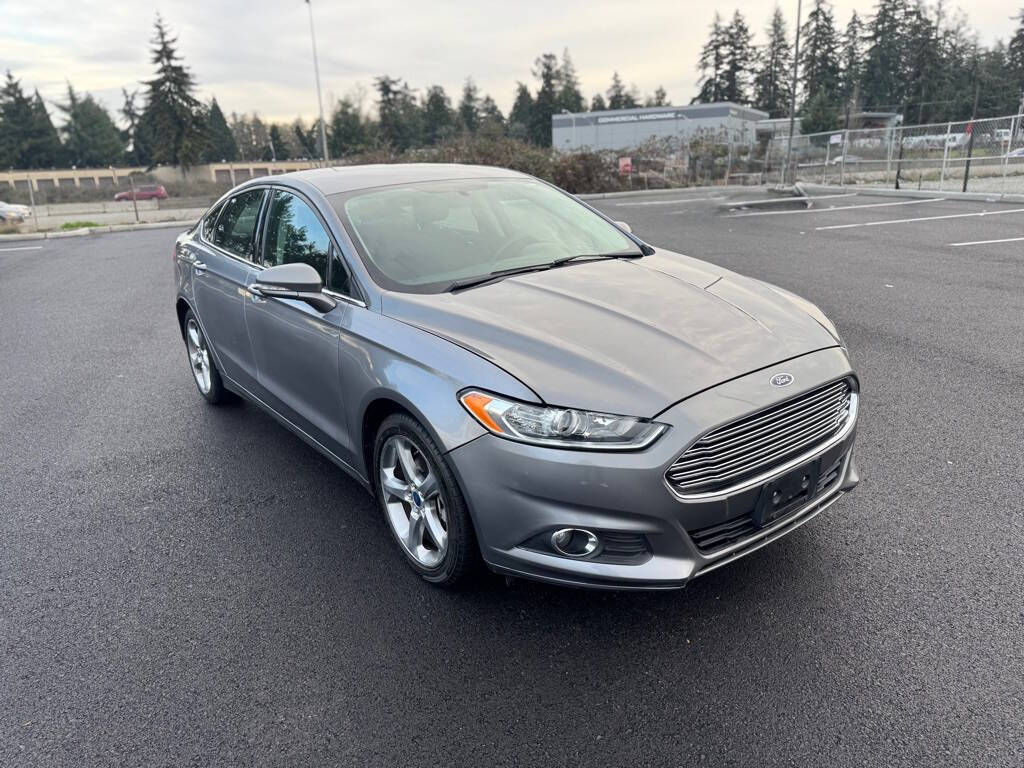 2013 Ford Fusion for sale at The Price King Auto in LAKEWOOD, WA