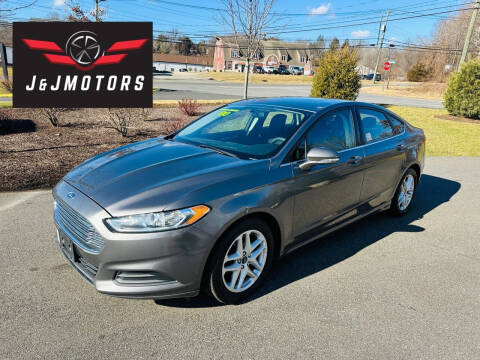 2014 Ford Fusion for sale at J & J MOTORS in New Milford CT