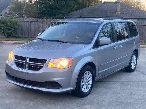 2014 Dodge Grand Caravan for sale at KM Motors LLC in Houston TX