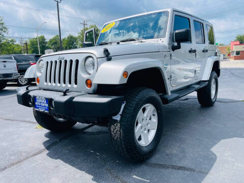 2012 Jeep Wrangler Unlimited for sale at Aurora Auto Center Inc in Aurora IL