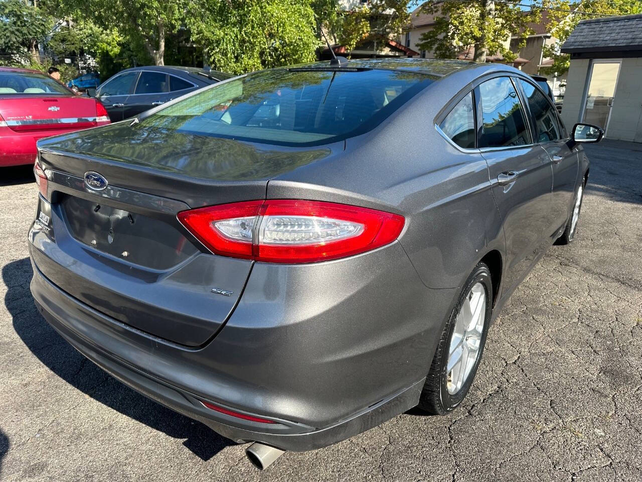 2013 Ford Fusion for sale at Kelly Auto Group in Cleveland, OH