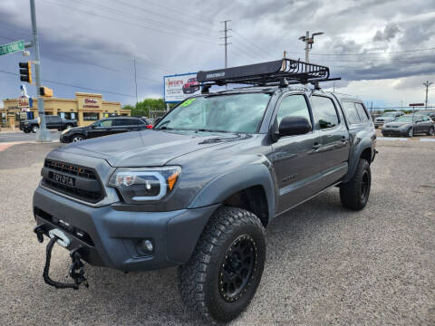 2015 Toyota Tacoma for sale at AUGE'S SALES AND SERVICE in Belen NM