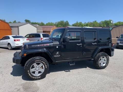 2012 Jeep Wrangler Unlimited for sale at CarTime in Rogers AR