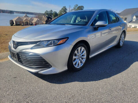2019 Toyota Camry for sale at Connected Auto Group in Macon GA