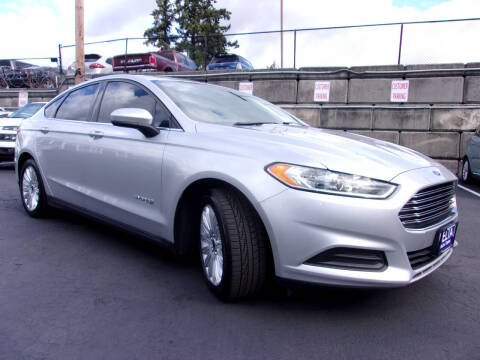 2015 Ford Fusion Hybrid for sale at Delta Auto Sales in Milwaukie OR