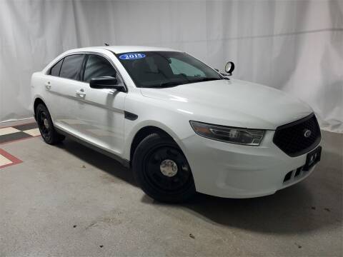 2015 Ford Taurus for sale at Tradewind Car Co in Muskegon MI