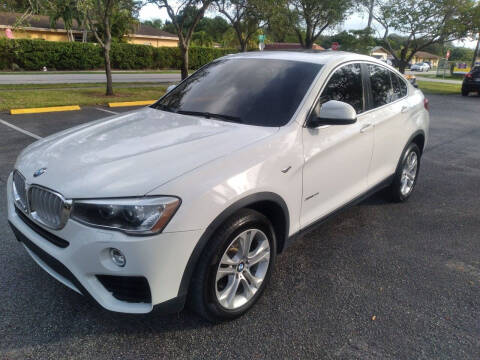 2015 BMW X4 for sale at P S AUTO ENTERPRISES INC in Miramar FL