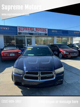 2014 Dodge Charger for sale at Supreme Motors in Leesburg FL