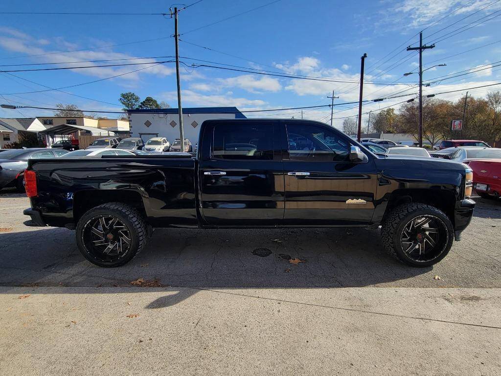 2014 Chevrolet Silverado 1500 for sale at DAGO'S AUTO SALES LLC in Dalton, GA