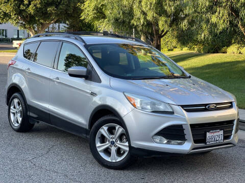 2013 Ford Escape for sale at MILLENNIUM MOTORS in Van Nuys CA