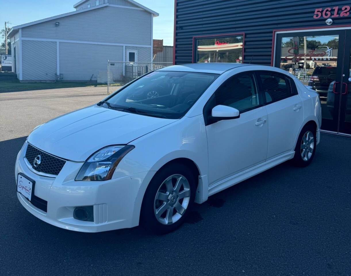 2012 Nissan Sentra for sale at SIGNATURE AUTOS LLC in Weston, WI