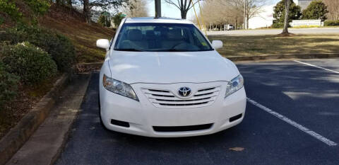 2009 Toyota Camry for sale at ATLANTA MOTORS in Suwanee GA