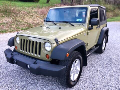 2013 Jeep Wrangler for sale at R.A. Auto Sales in East Liverpool OH