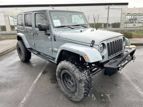 2014 Jeep Wrangler Unlimited for sale at Sunset Auto Wholesale in Tacoma WA