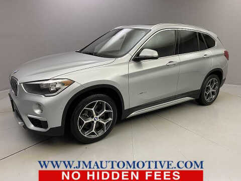 2018 BMW X1 for sale at J & M Automotive in Naugatuck CT