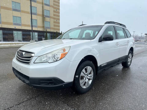 2012 Subaru Outback for sale at The Car Mart in Milford IN