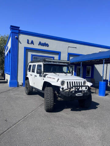 2014 Jeep Wrangler Unlimited for sale at LA AUTO RACK in Moses Lake WA