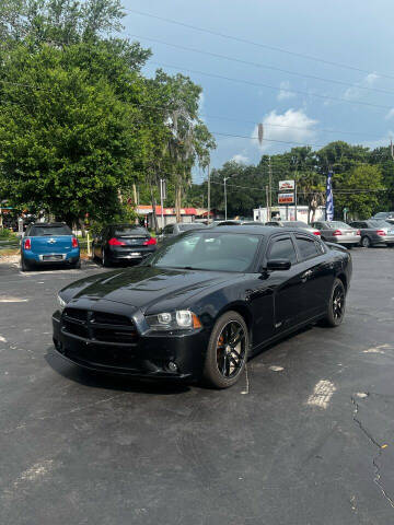 2014 Dodge Charger for sale at BSS AUTO SALES INC in Eustis FL