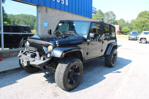 2015 Jeep Wrangler Unlimited for sale at 1st Choice Autos in Smyrna GA