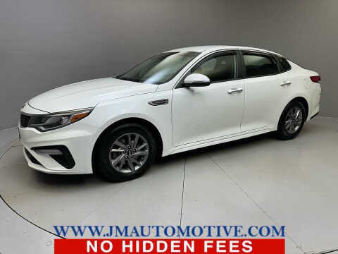 2019 Kia Optima for sale at J & M Automotive in Naugatuck CT