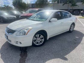 2012 Nissan Altima for sale at Douglas Auto Brokers LLC in Snellville GA