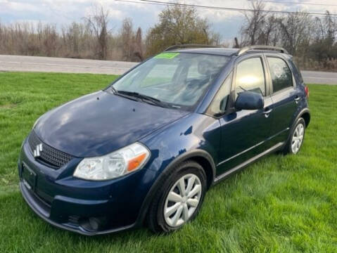 2010 Suzuki SX4 Crossover for sale at FUSION AUTO SALES in Spencerport NY