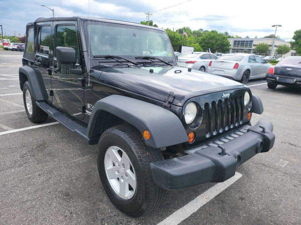 2009 Jeep Wrangler Unlimited for sale at First Place Auto Sales LLC in Rock Hill, SC