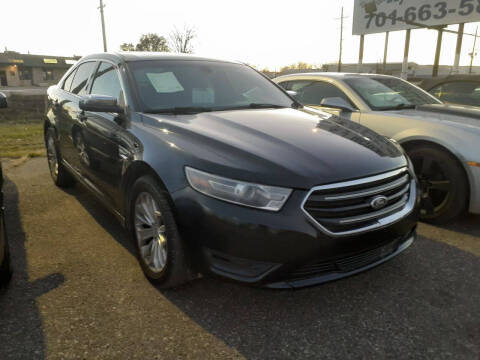 2015 Ford Taurus for sale at L & J Motors in Mandan ND