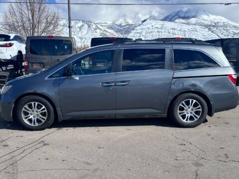 2012 Honda Odyssey for sale at REVOLUTIONARY AUTO in Lindon UT
