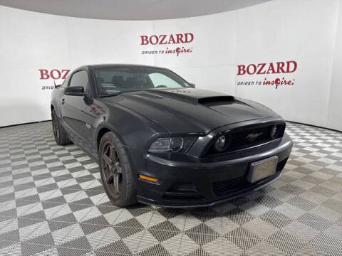2013 Ford Mustang for sale at BOZARD FORD in Saint Augustine FL