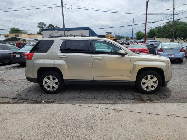 2014 GMC Terrain for sale at DAGO'S AUTO SALES LLC in Dalton, GA