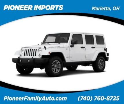 2014 Jeep Wrangler Unlimited for sale at Pioneer Family Preowned Autos of WILLIAMSTOWN in Williamstown WV