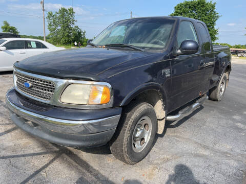 2001 Ford F-150 for sale at HEDGES USED CARS in Carleton MI