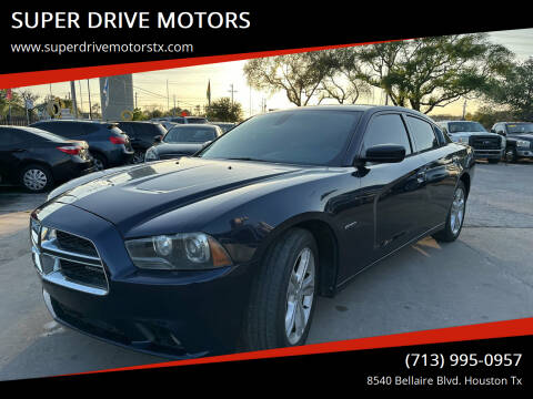2011 Dodge Charger for sale at SUPER DRIVE MOTORS in Houston TX