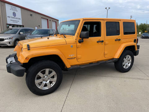 2012 Jeep Wrangler Unlimited for sale at Midtown Motors and Service Center in Fargo ND