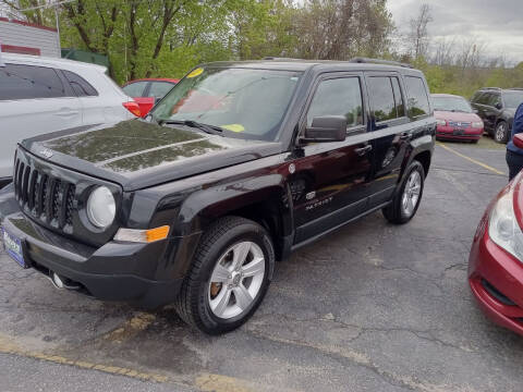 2011 Jeep Patriot for sale at Howe's Auto Sales in Lowell MA