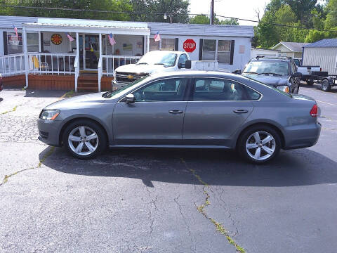 2014 Volkswagen Passat for sale at R V Used Cars LLC in Georgetown OH