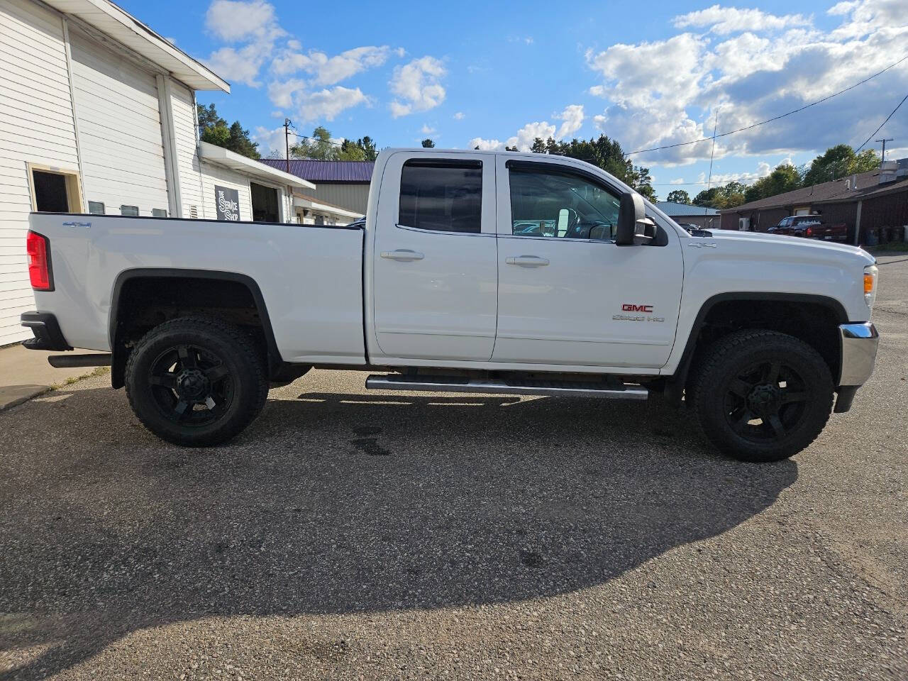 2015 GMC Sierra 2500HD for sale at DANGO AUTO SALES in HOWARD CITY, MI