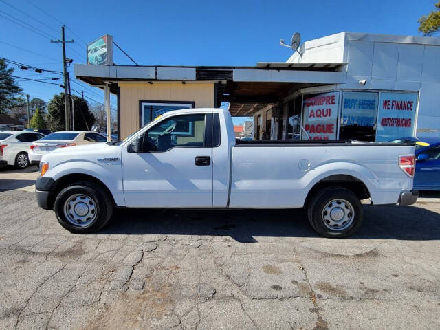 2013 Ford F-150 for sale at DAGO'S AUTO SALES LLC in Dalton, GA