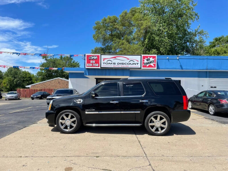 2012 Cadillac Escalade for sale at Tom's Discount Auto Sales in Flint MI