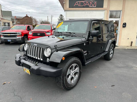 2017 Jeep Wrangler Unlimited for sale at ADAM AUTO AGENCY in Rensselaer NY